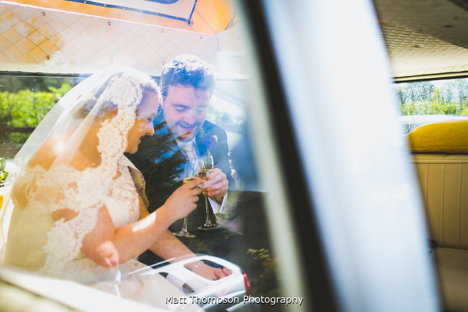 champagne in the wedding car