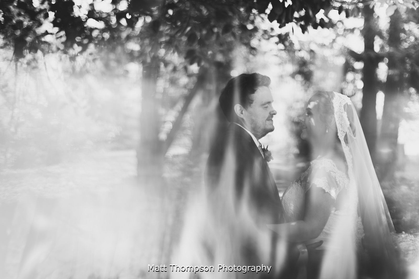 bride and groom pose for photos