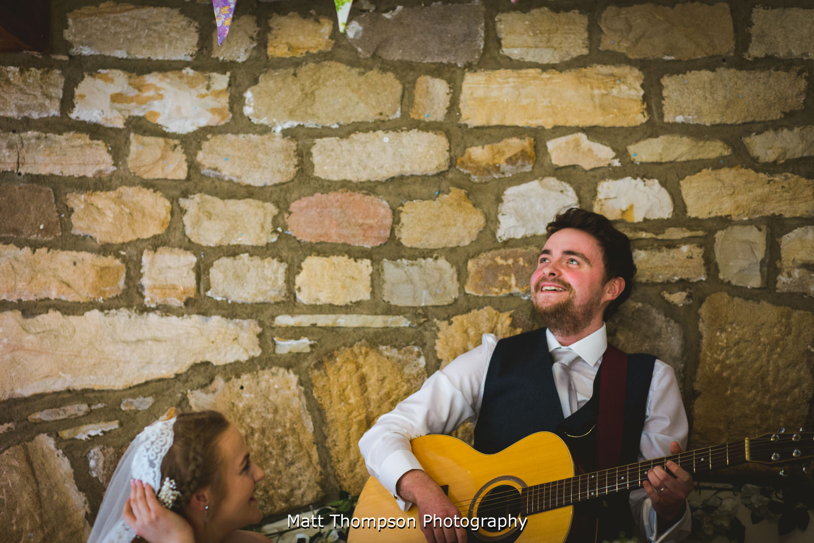 groom sings to bride