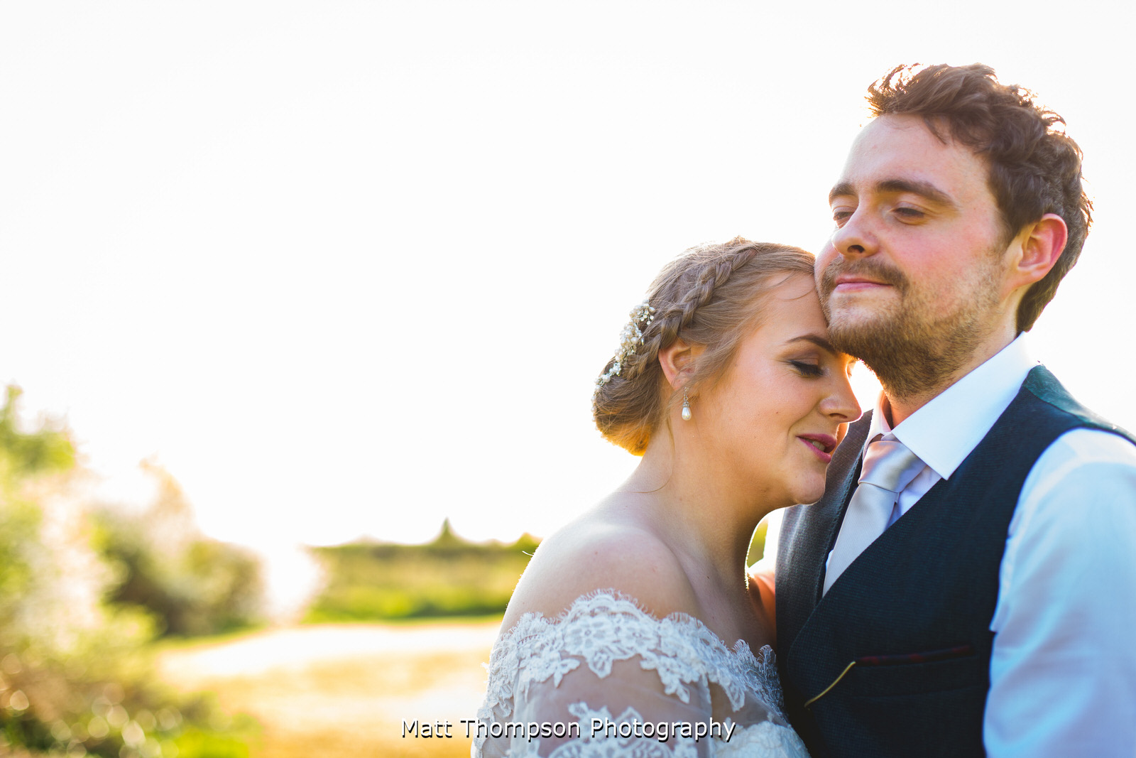 bride and groom embrace