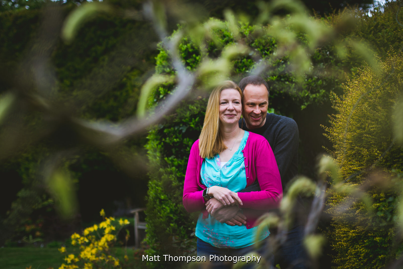couple pose on their engagement photoshoot