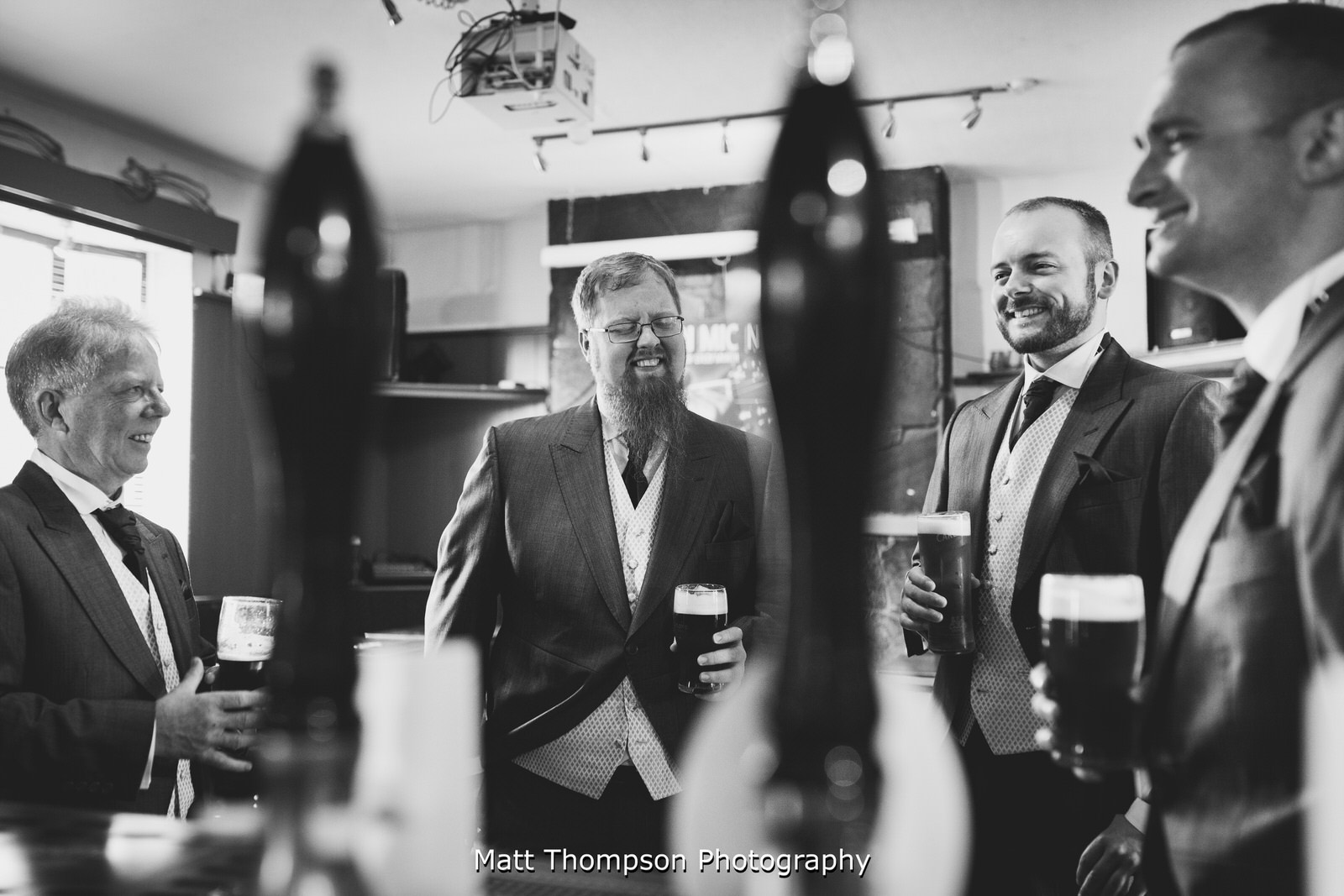 groomsmen laughing