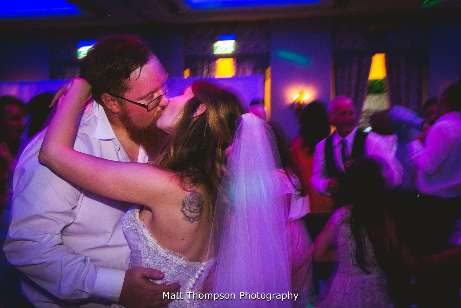 newly weds kiss