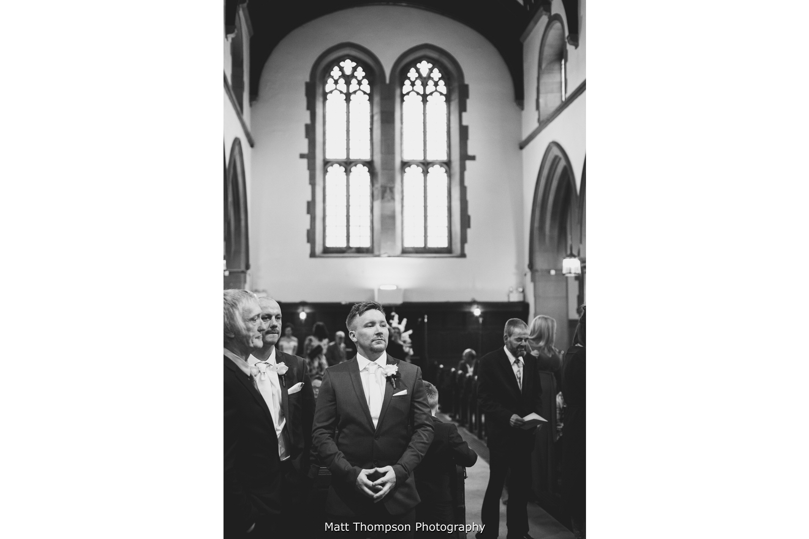 groom waiting at the church