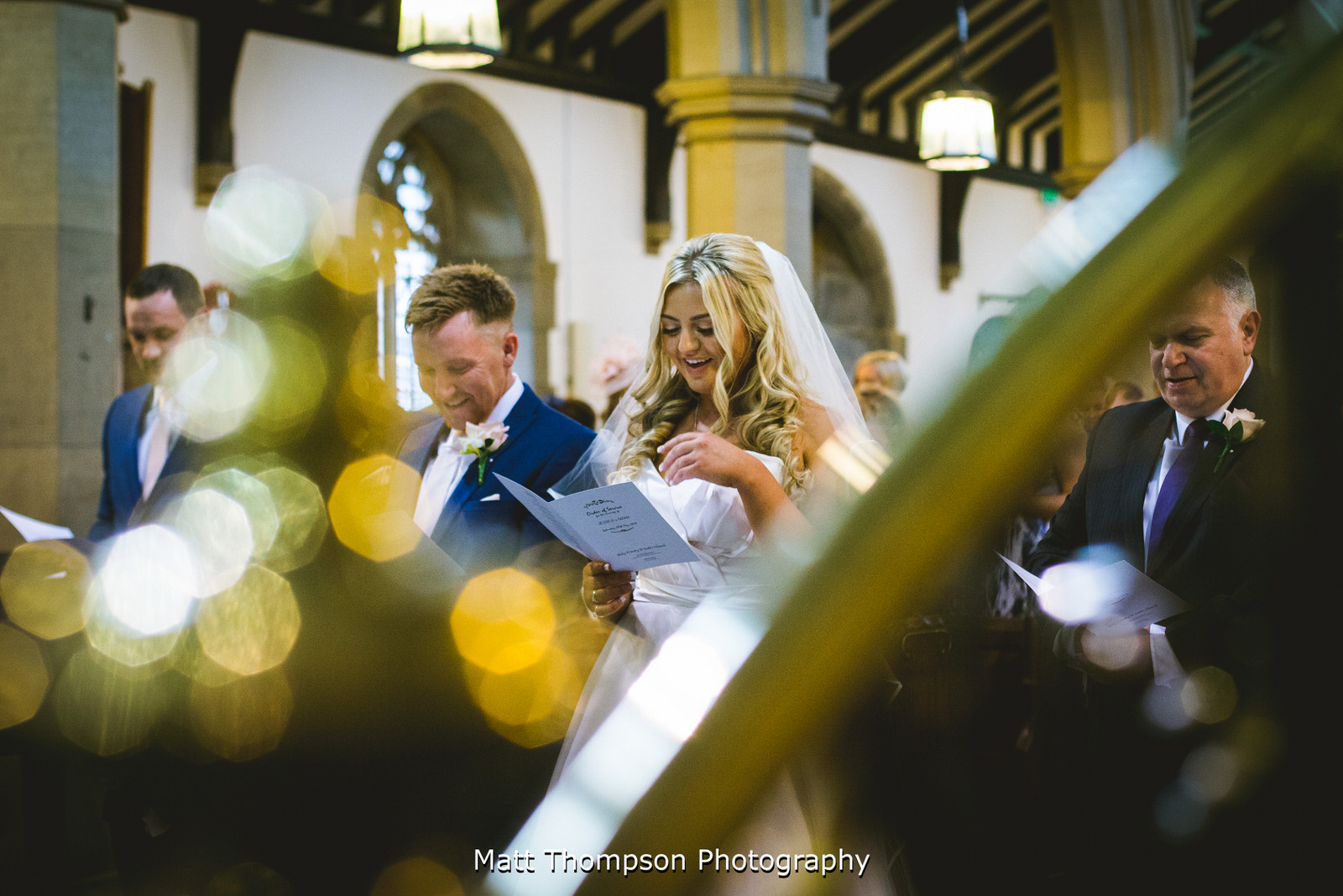 bride and groom laughing