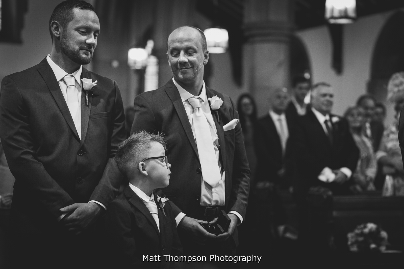 best man holding the rings