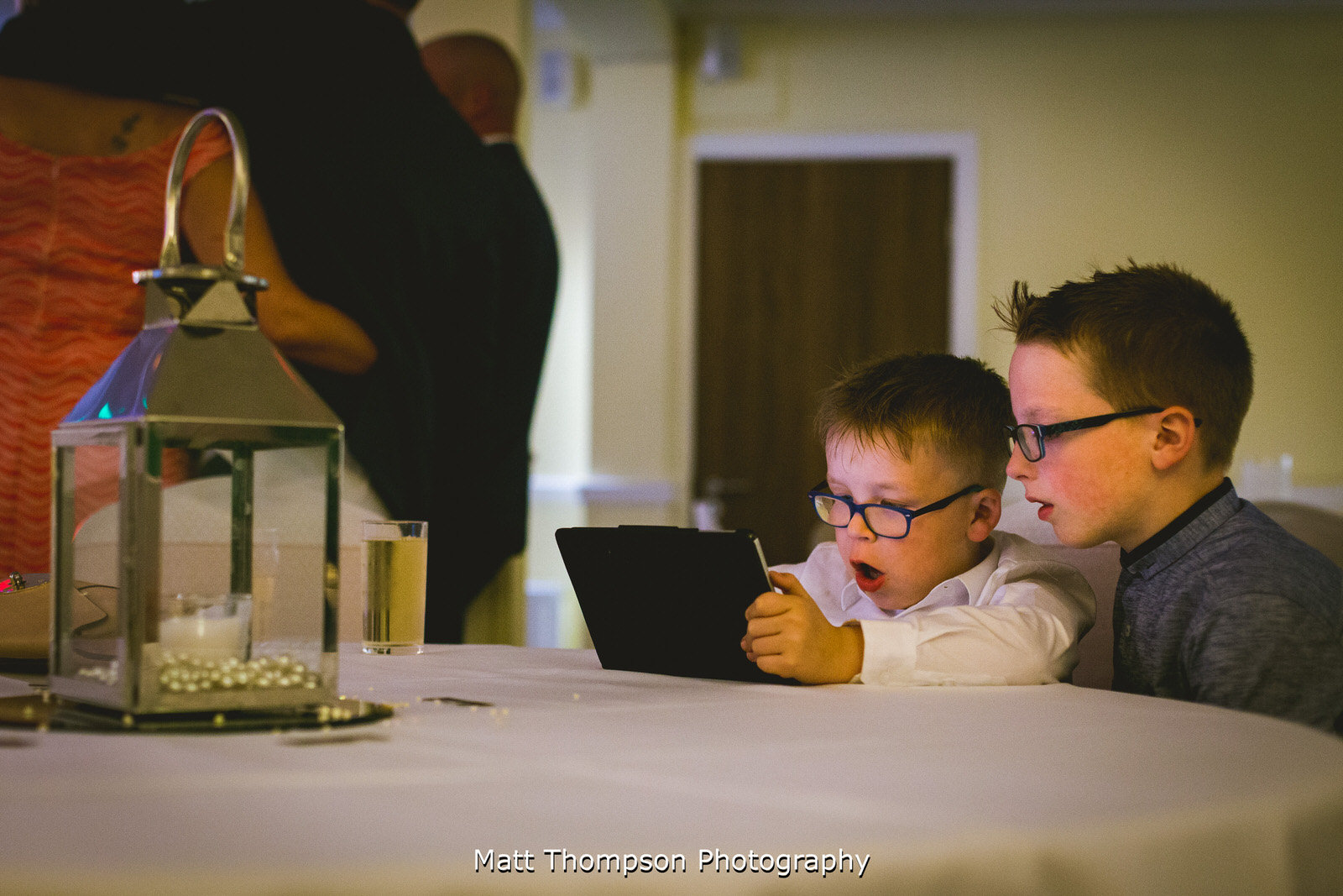 boys looking on tablets