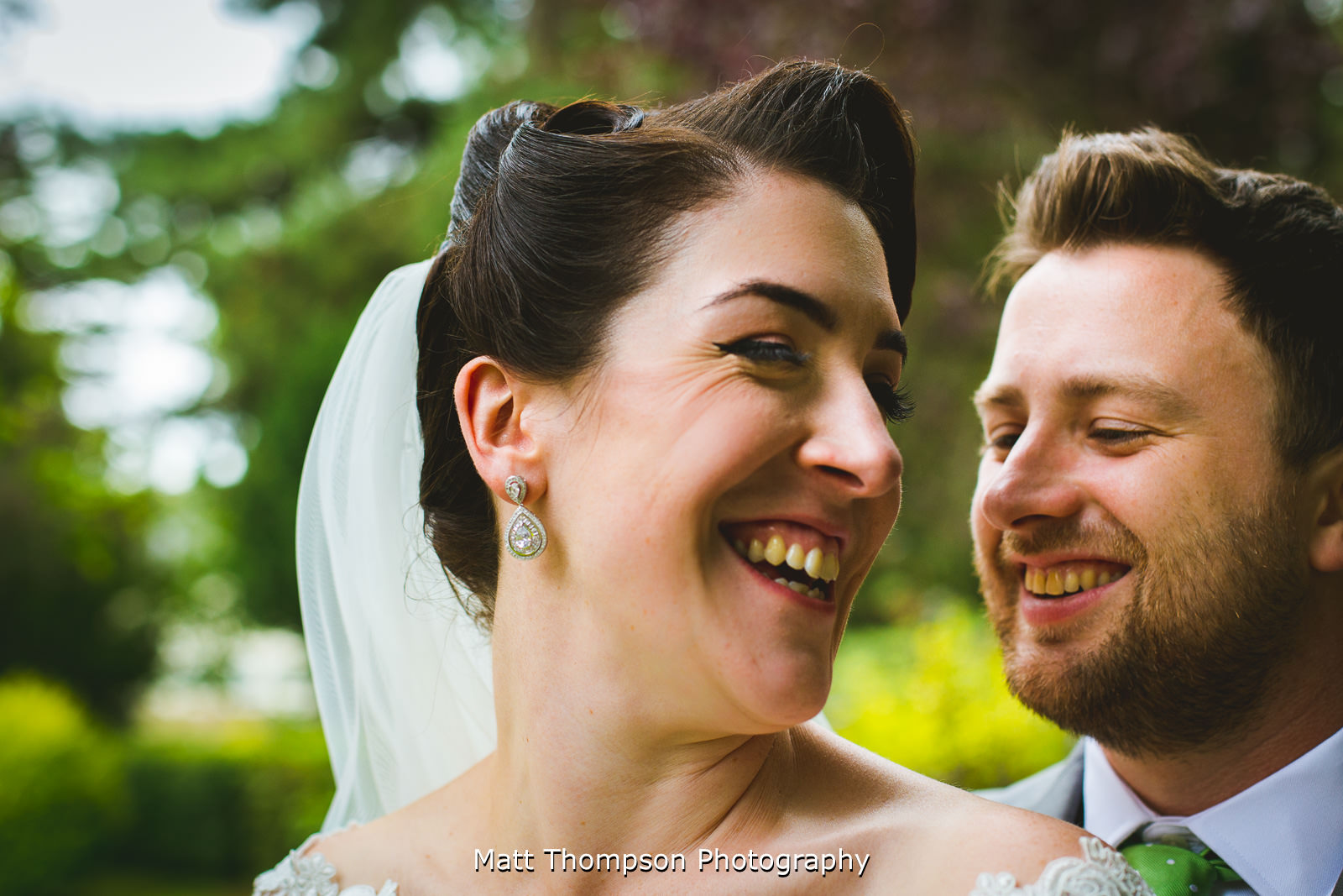 bride laughing at the old swan