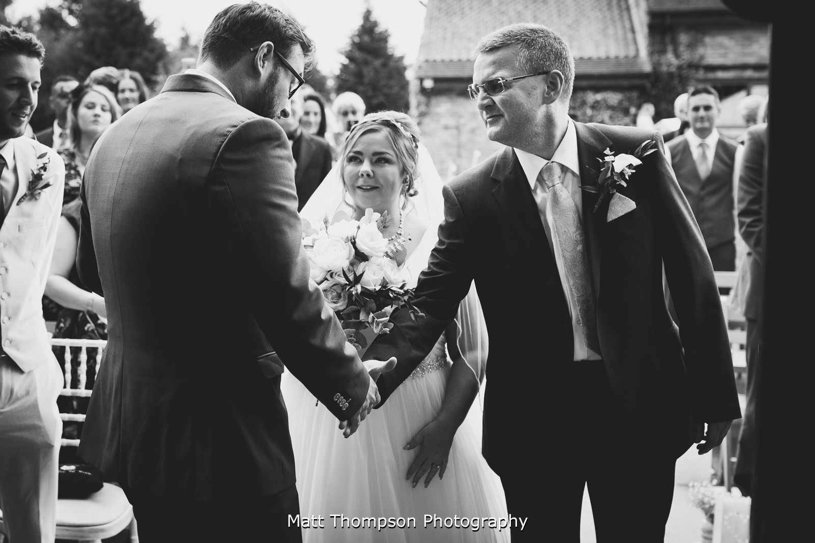 groom hand shake