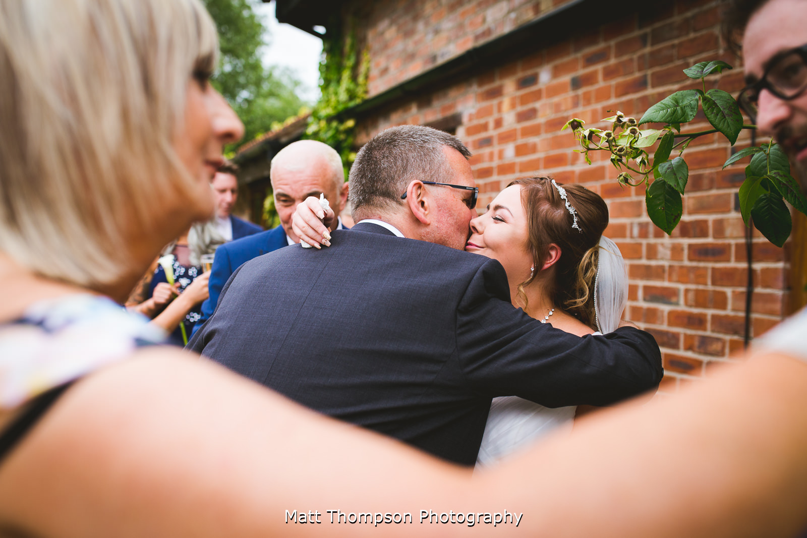 father of the bride hugs
