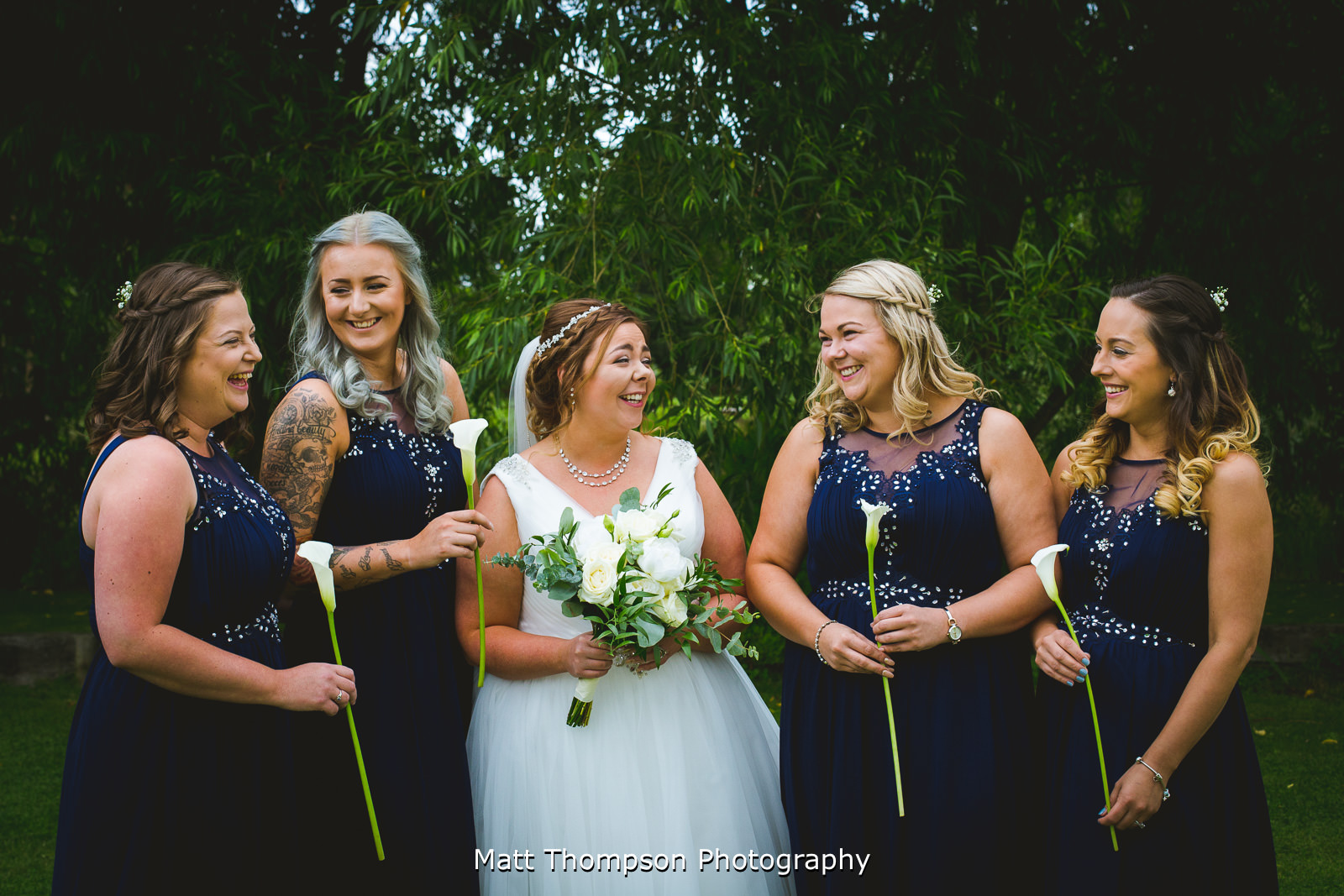 bride and bridesmaids group photo
