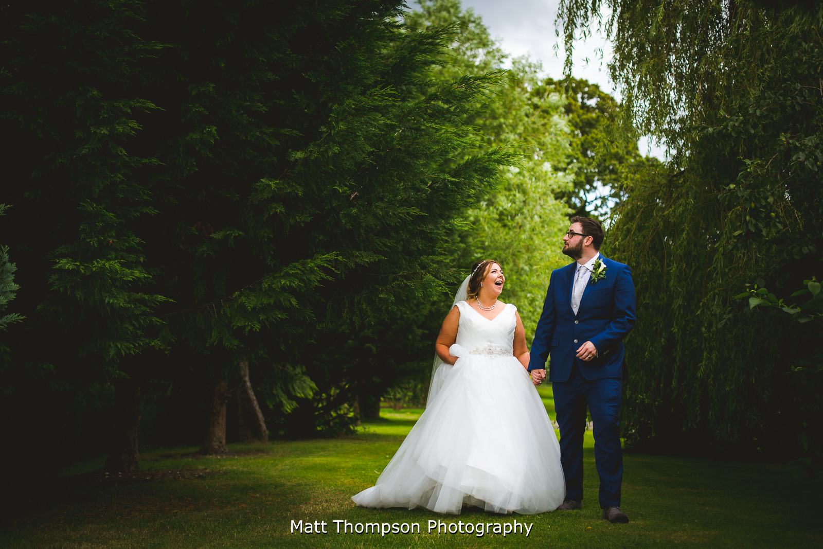 bride and groom talking a walk
