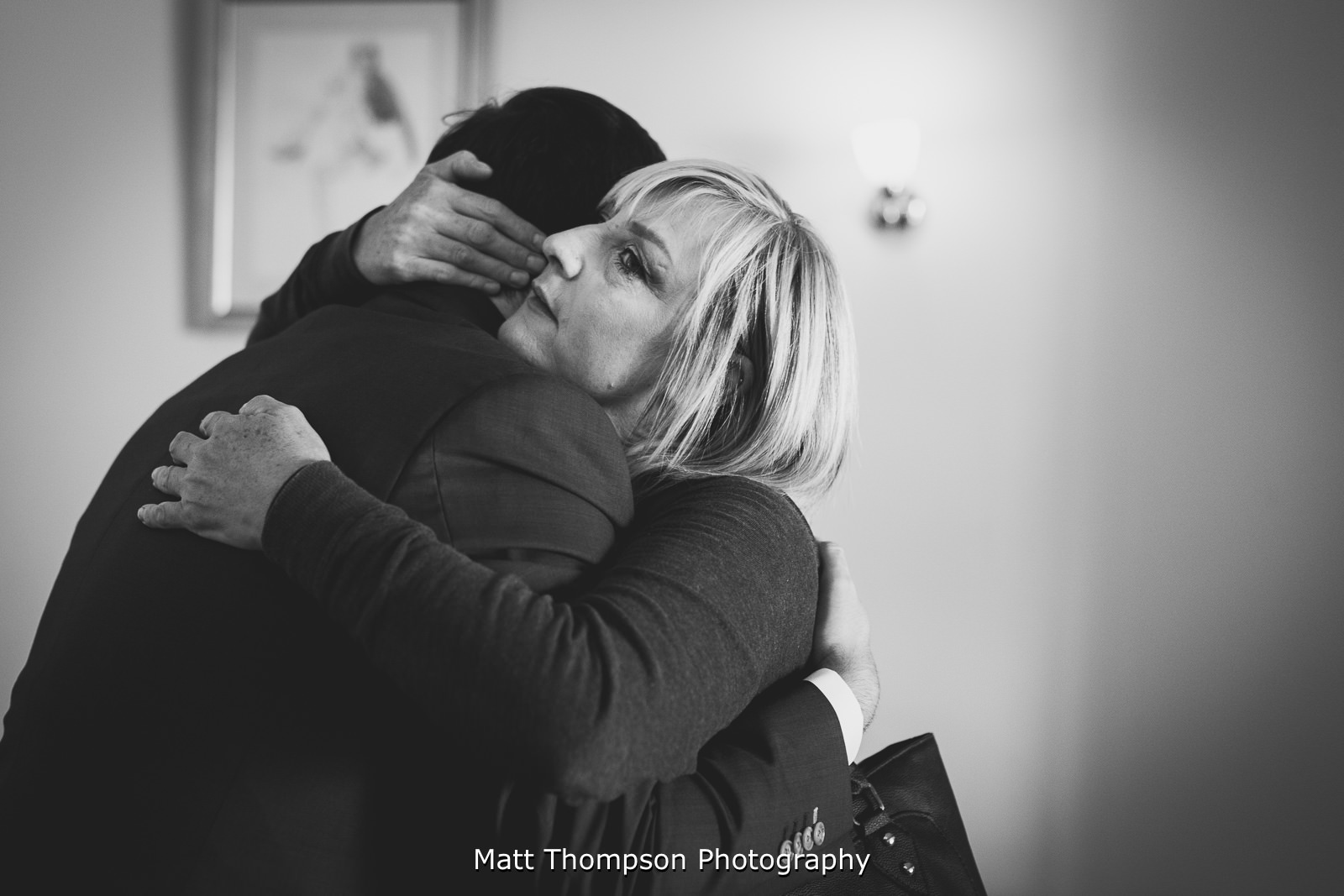 mother of the groom hug