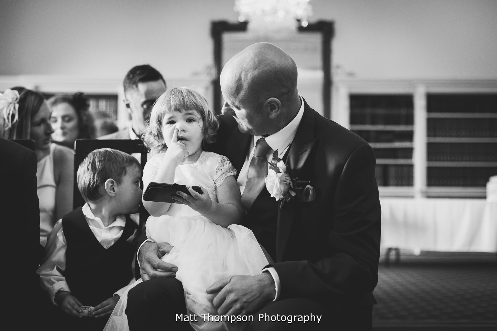 flower girl picking nose