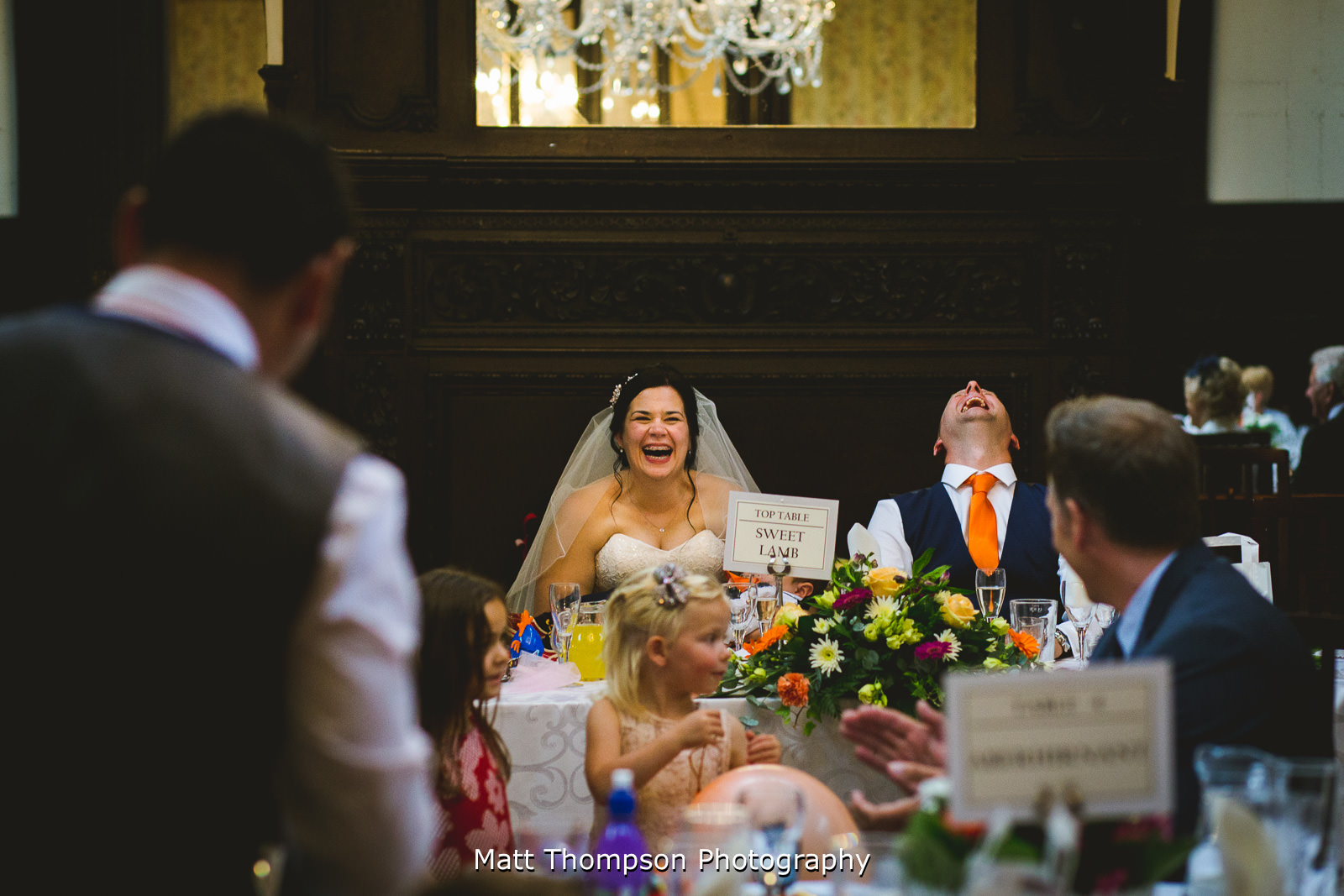 bride and groom laughing