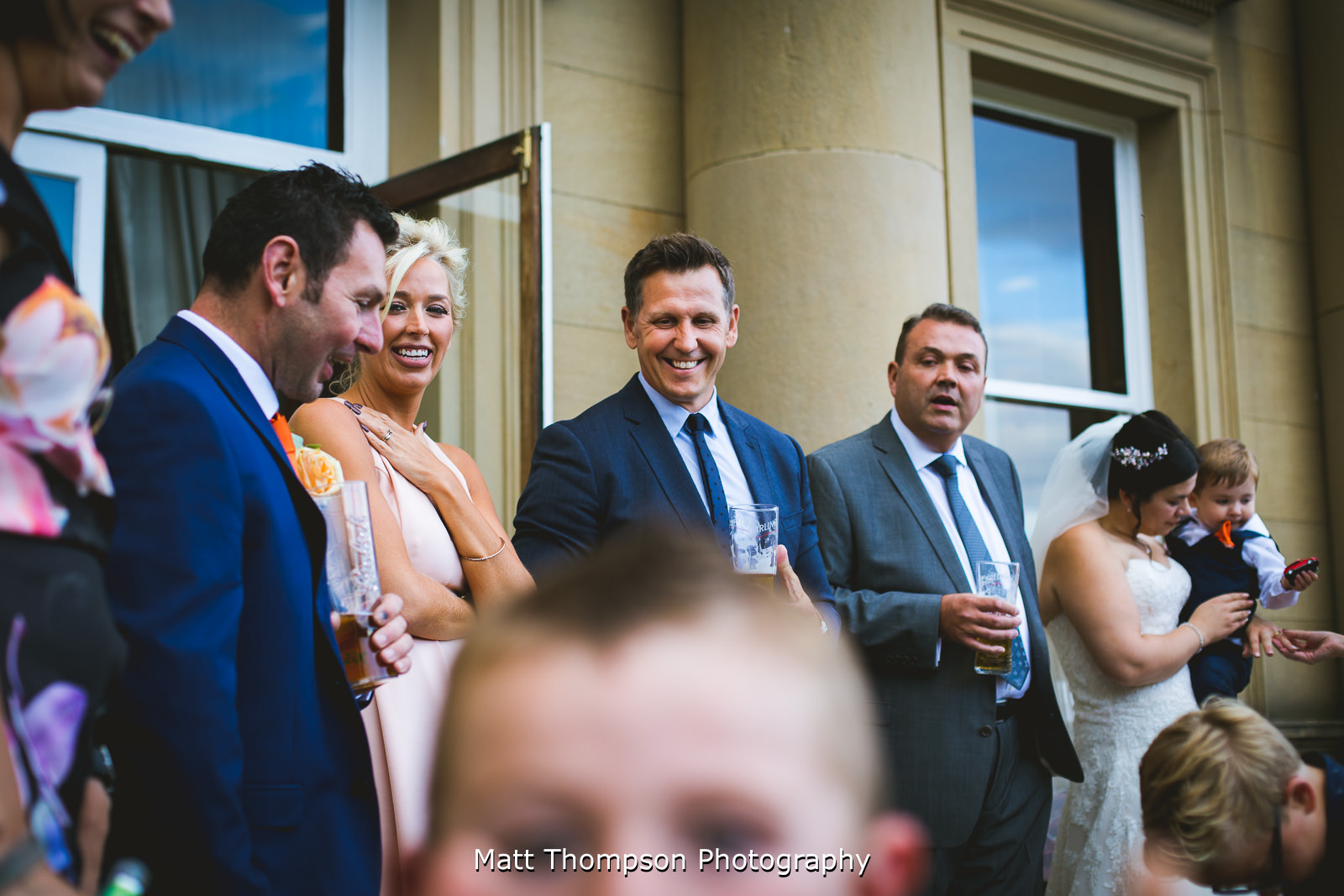 laughing and drinking