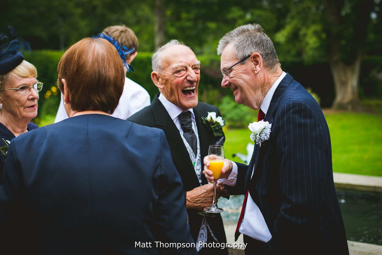 father of the bride laughing
