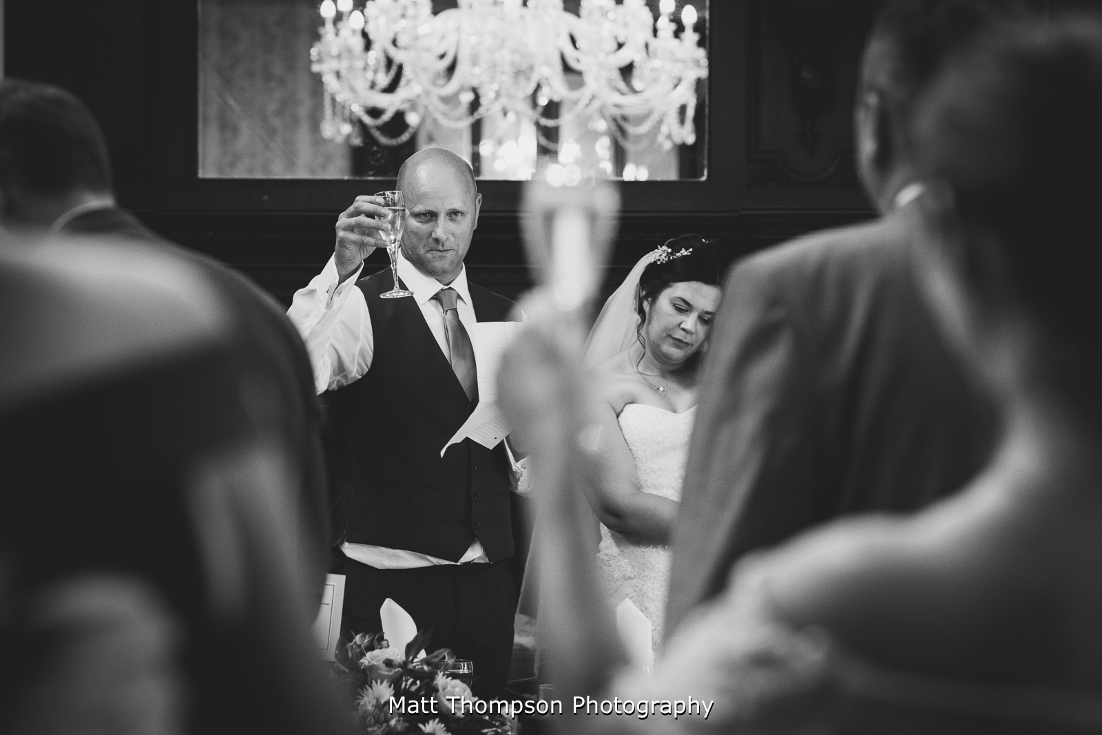 groom making a toast