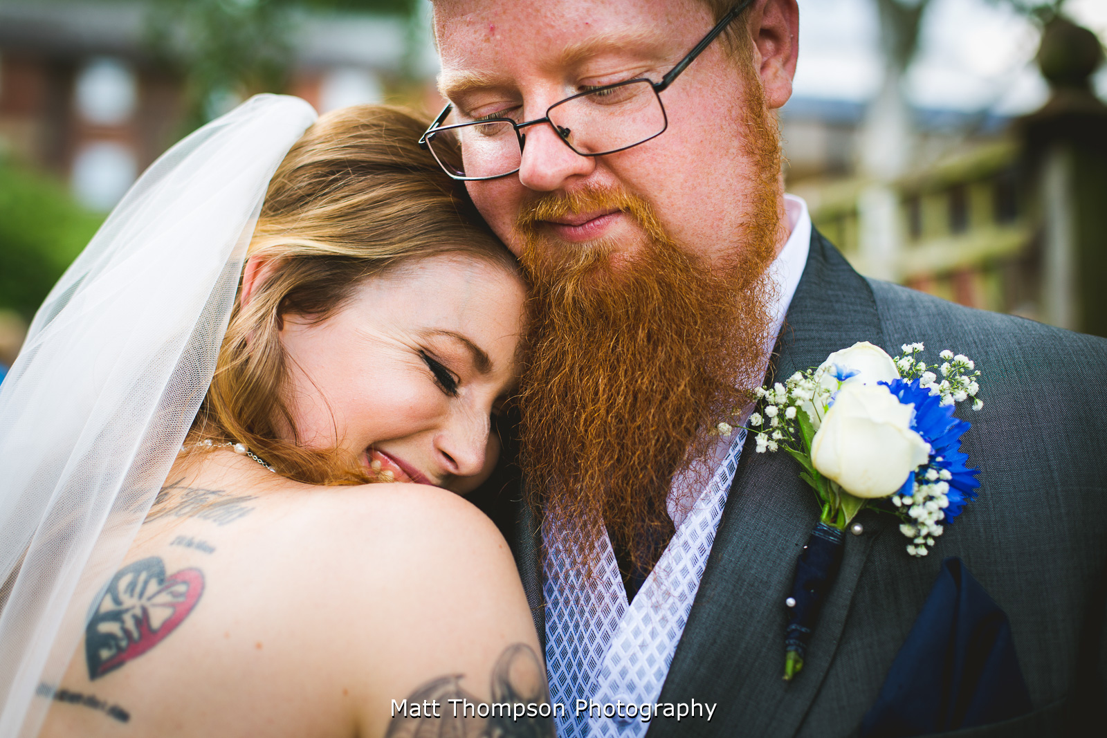 couple laughing and cuddling