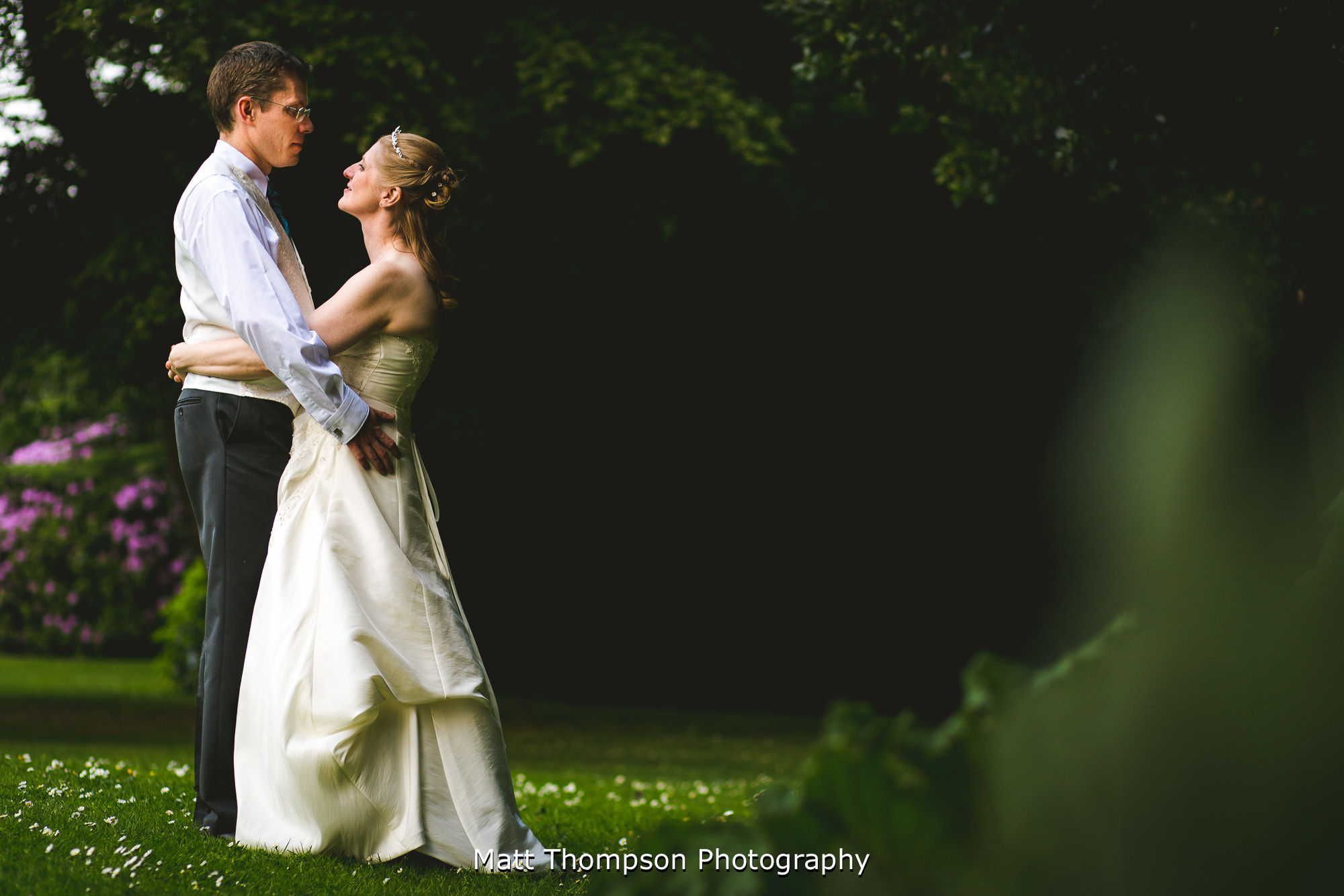 bride and groom cuddling