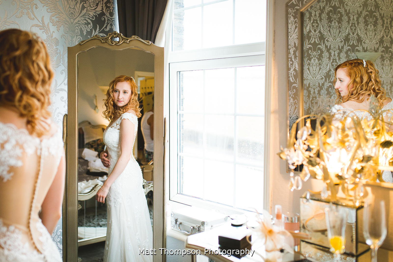 bride looking in the mirror