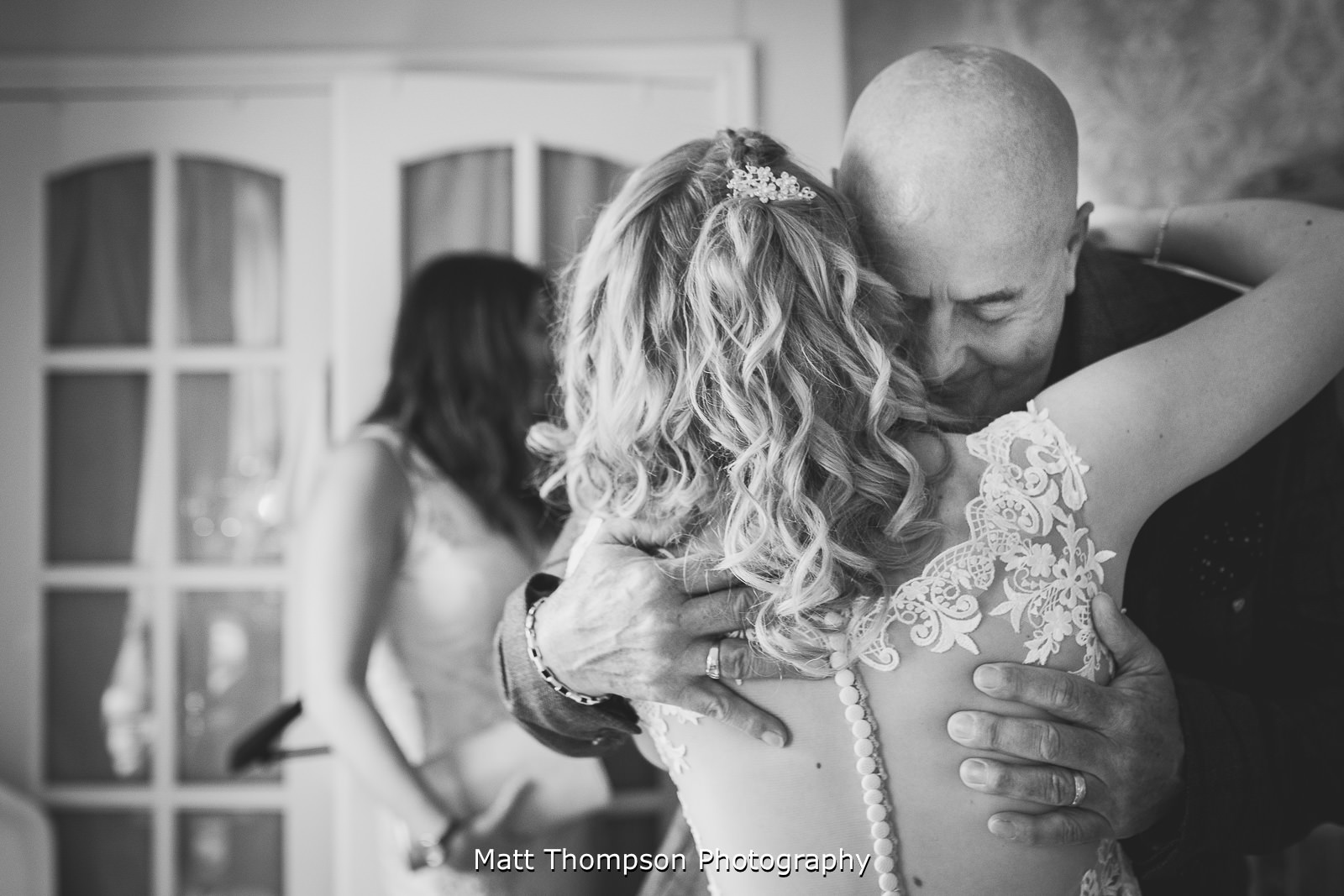 grandad hugging grandaughter