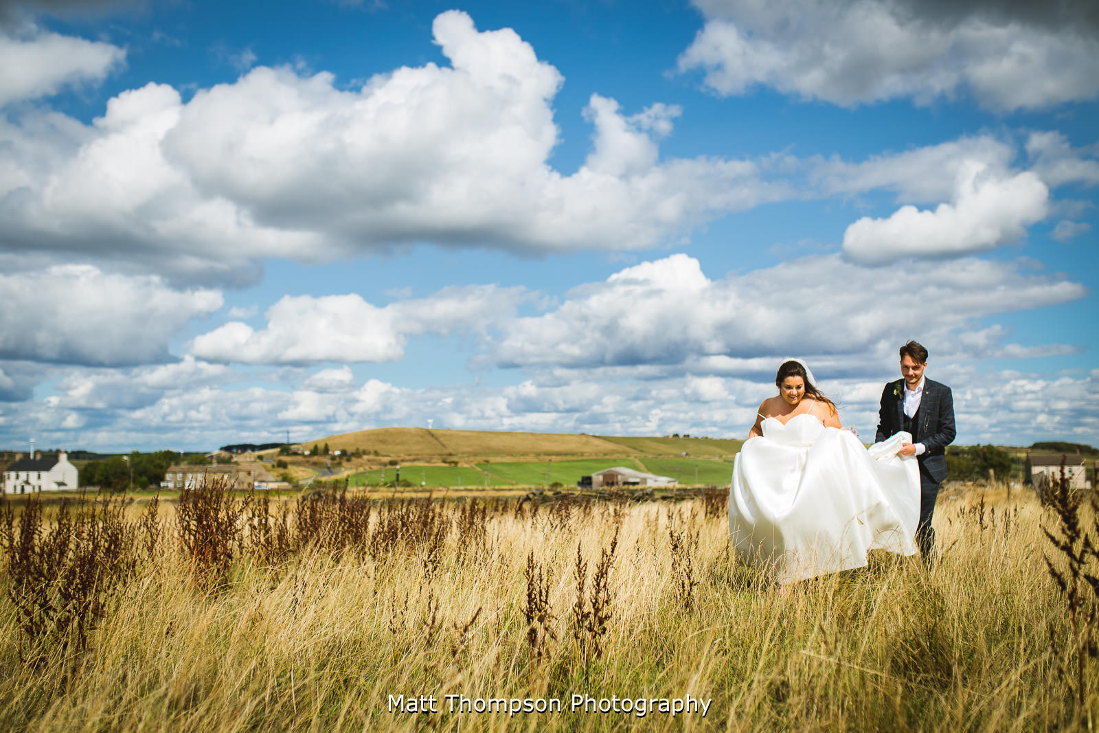carrying the wedding dress train