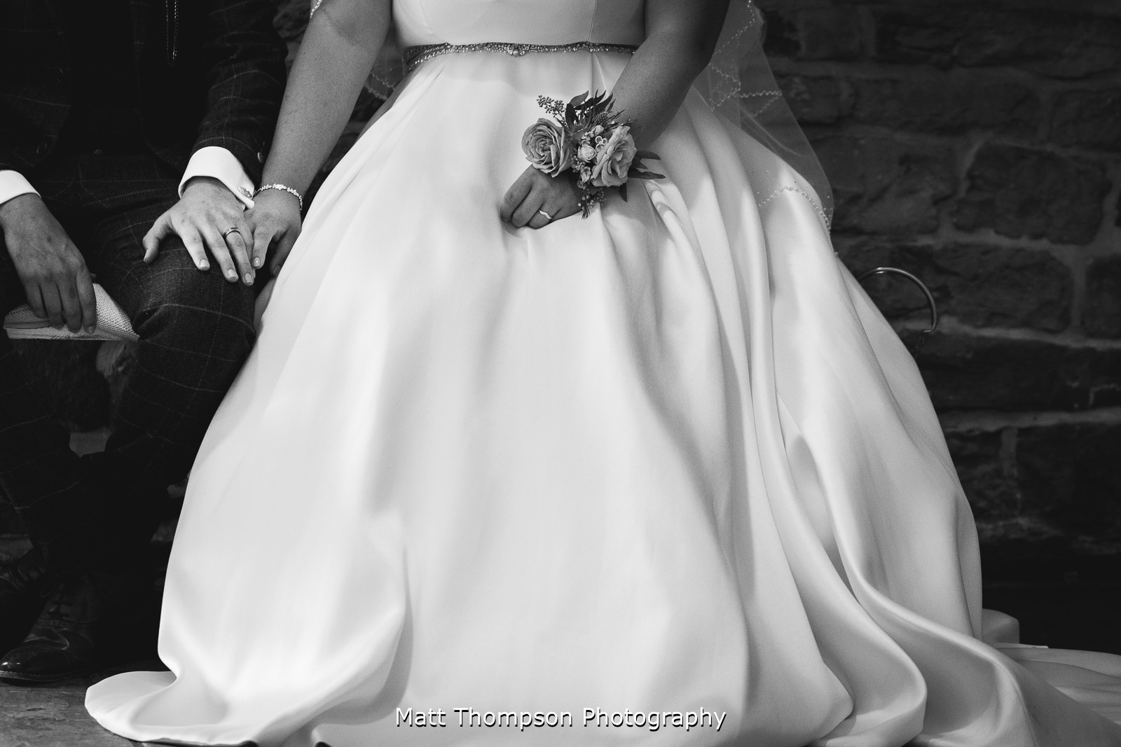 holding hands during wedding ceremony