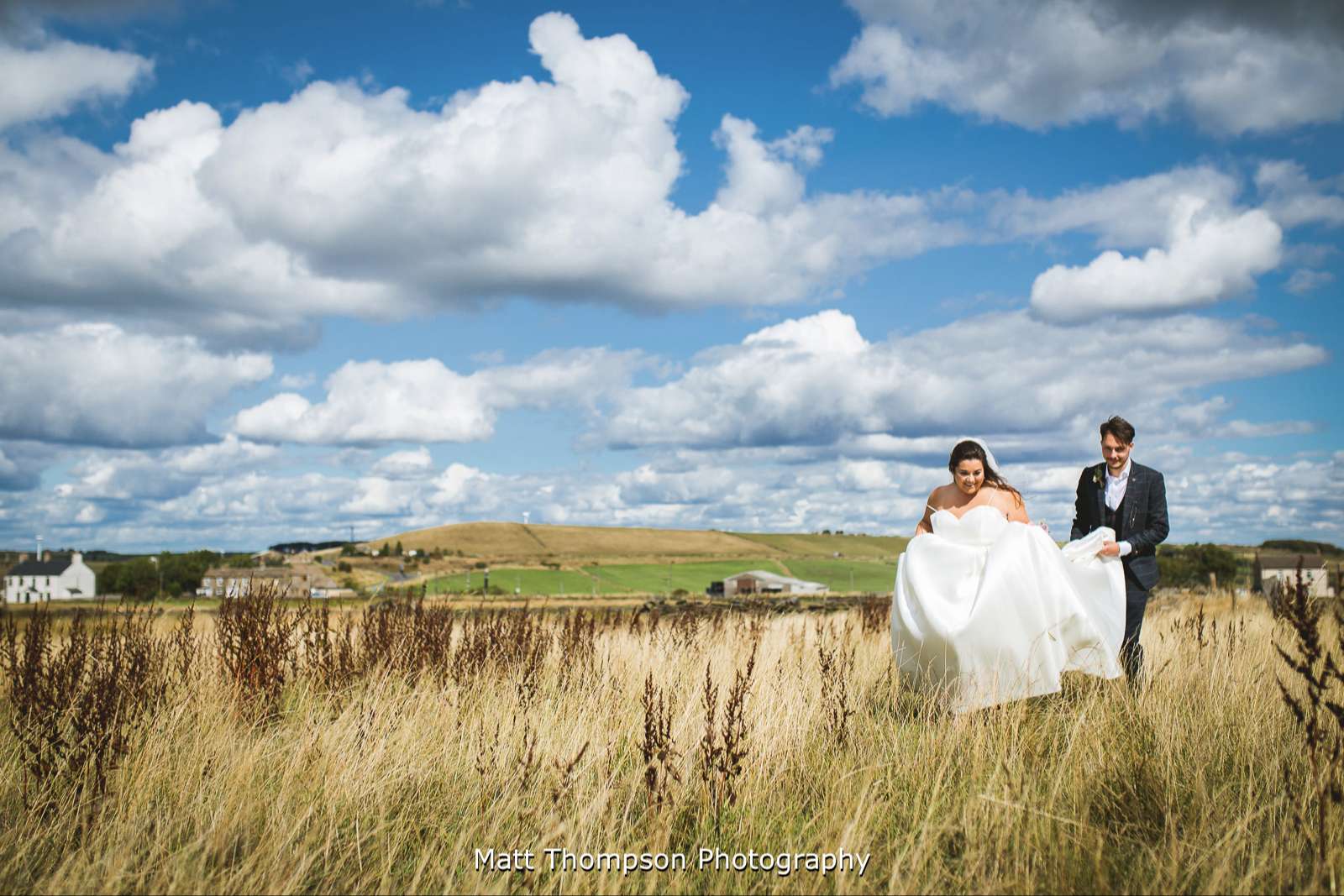 Carrying the wedding dress train
