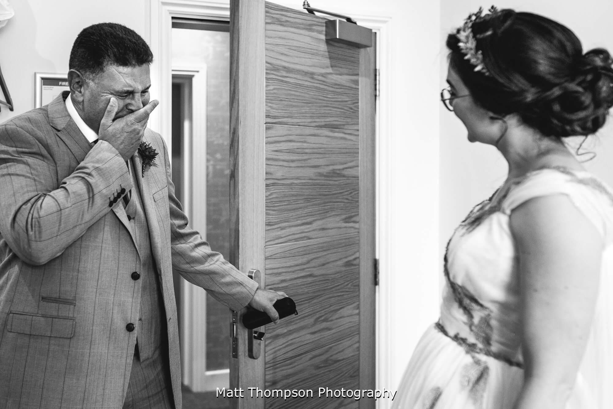 Father of the bride crying