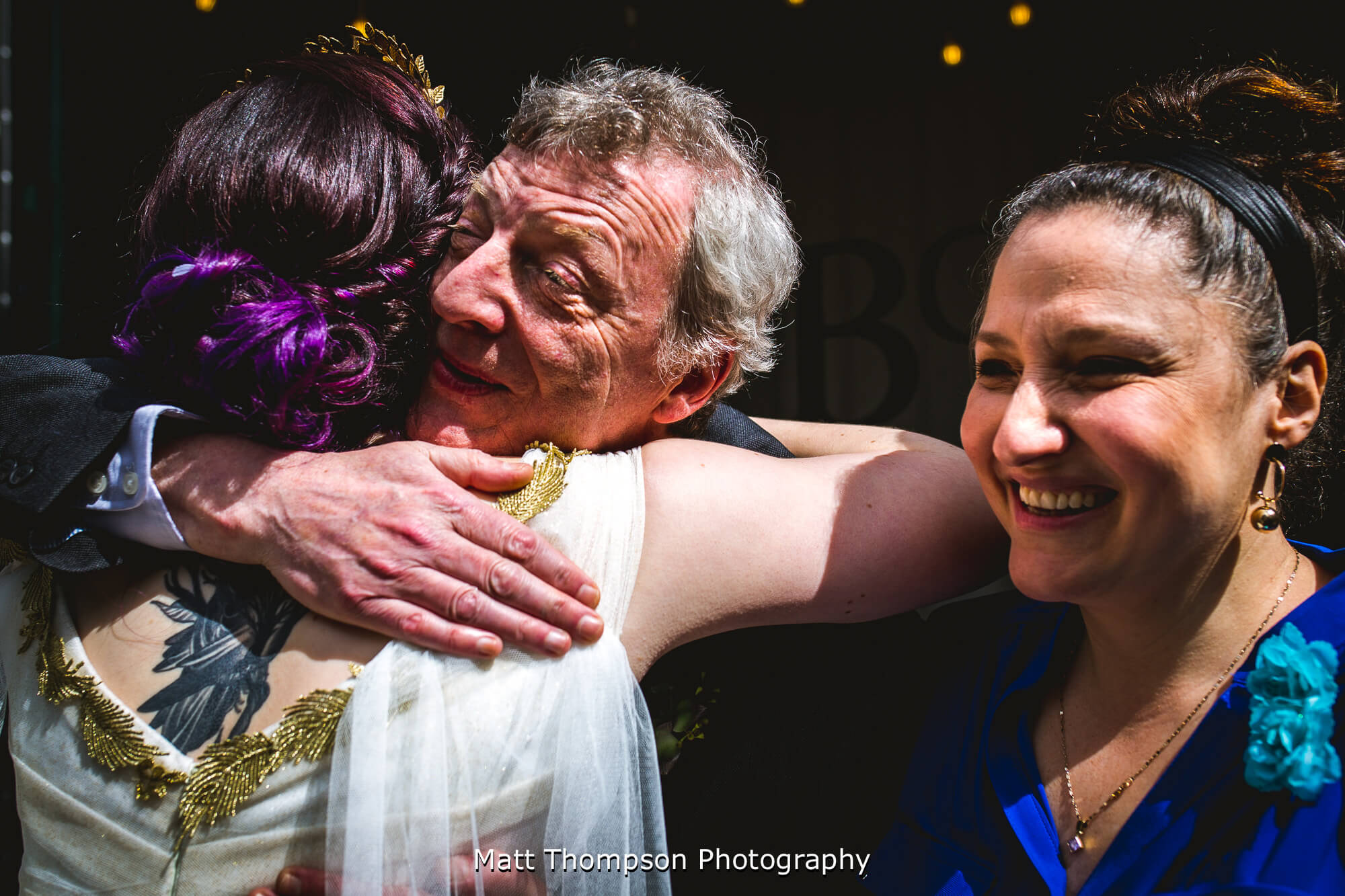 Hugs from the grooms dad