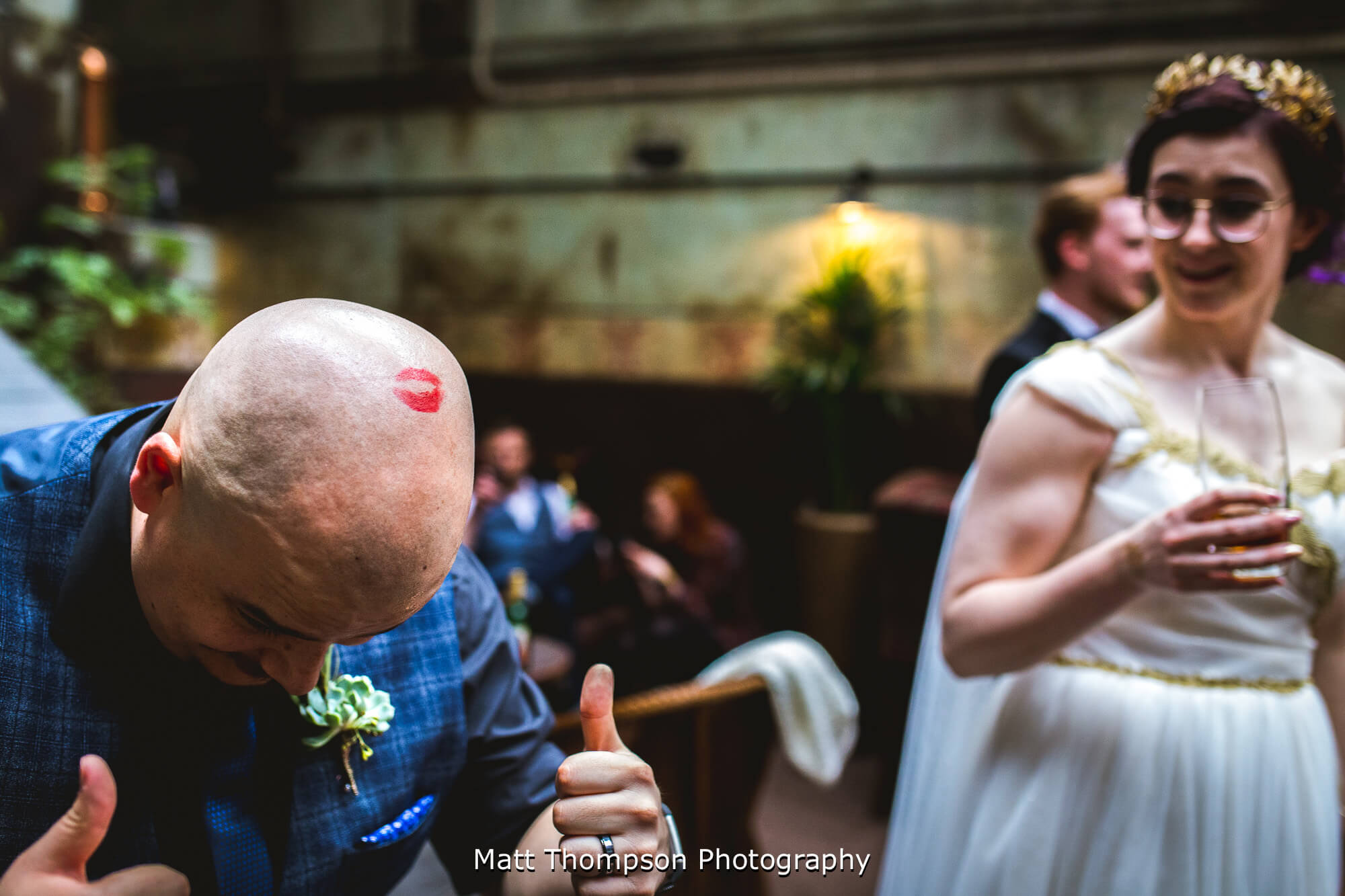 Lipstick on grooms head