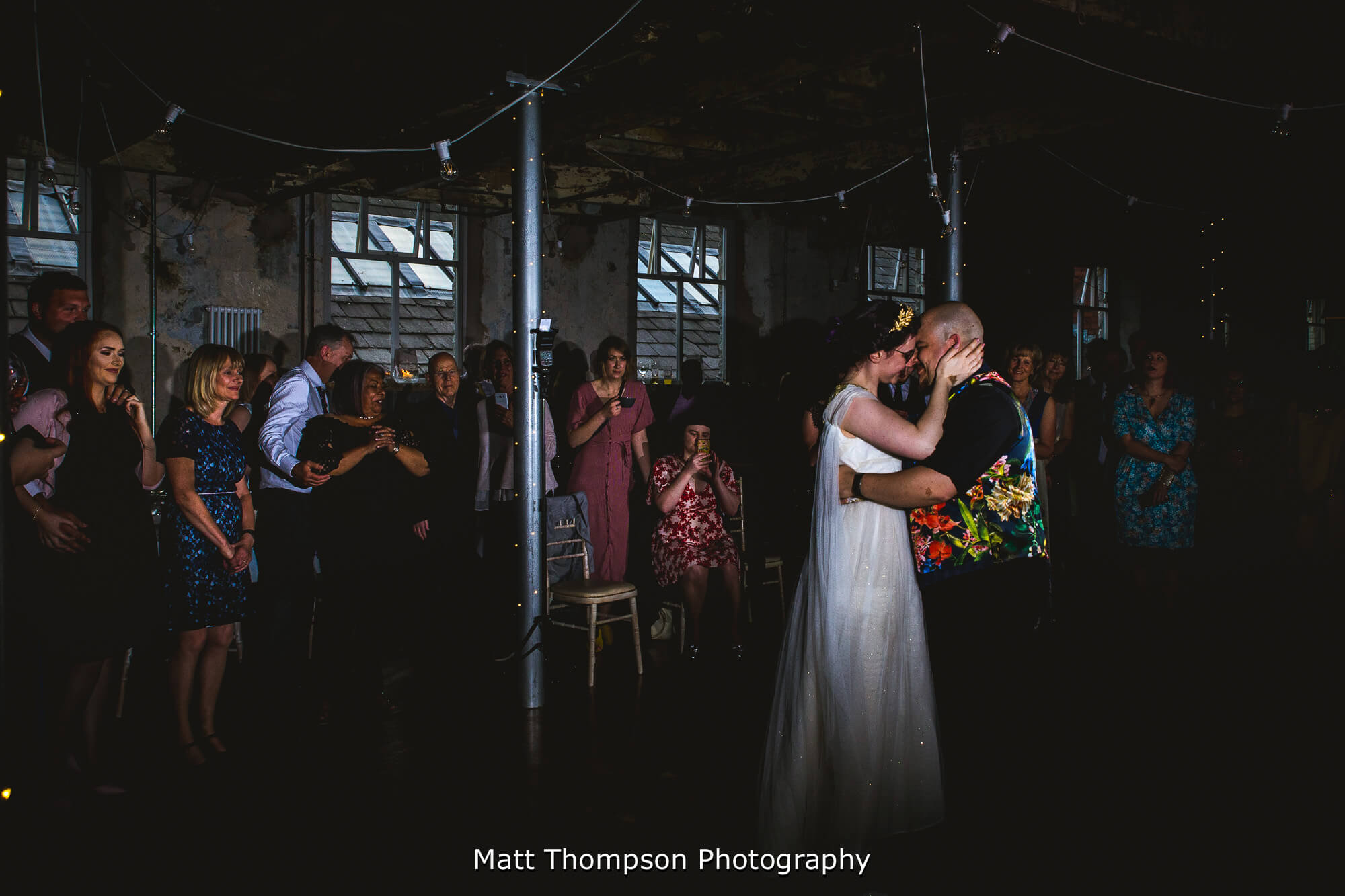 Guests watching first dance at Holmes mill