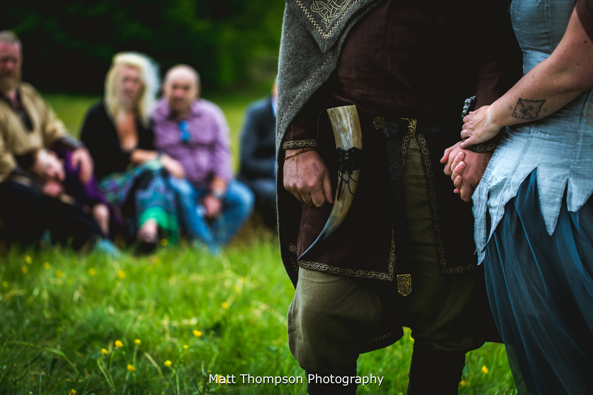 Bride and groom holding hands