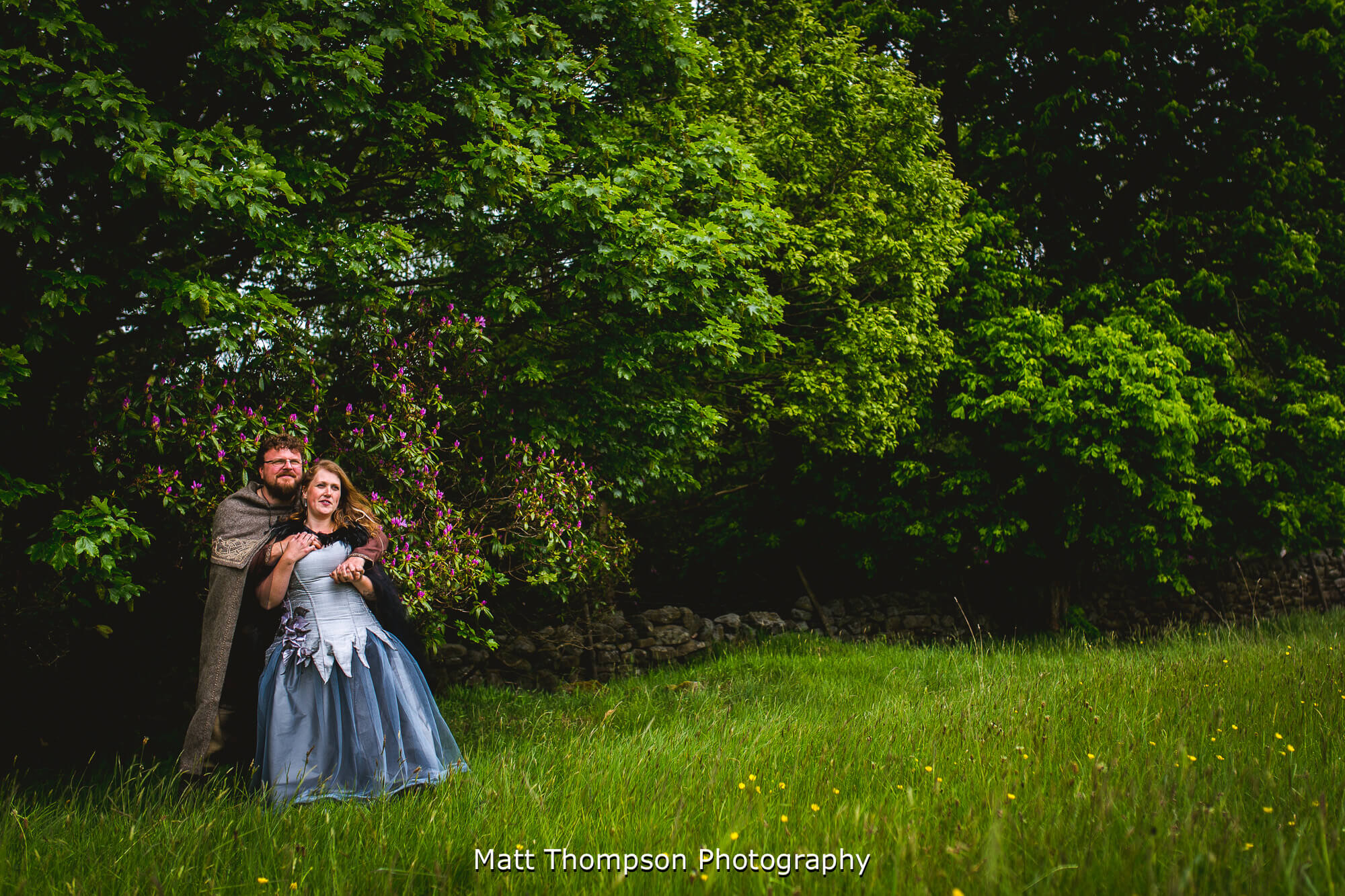 Bride and groom cuddling
