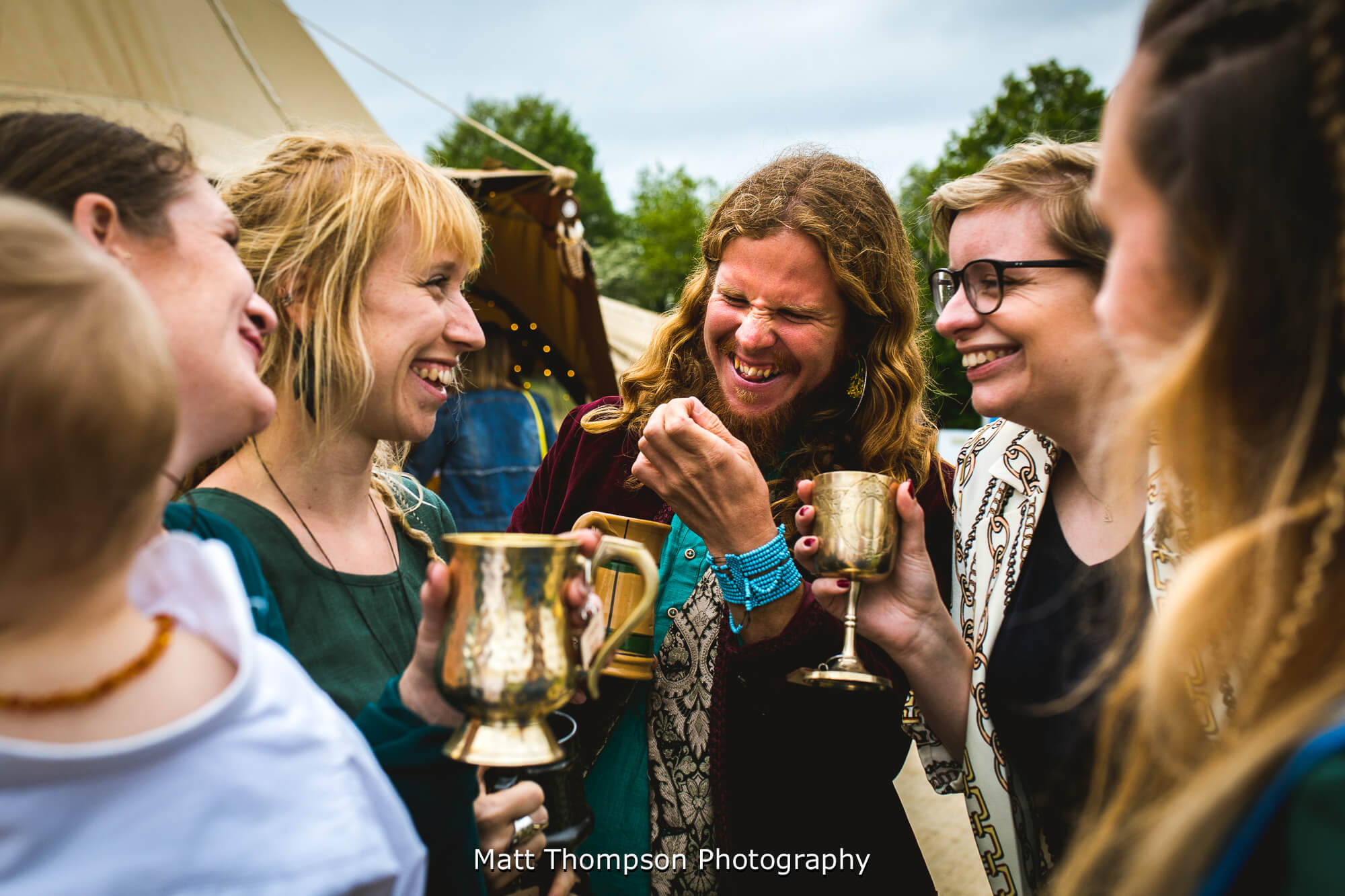 Wedding guests laughing