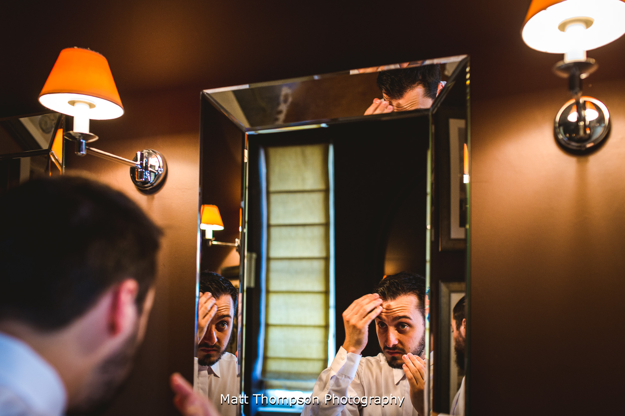 groom to be doing his hair