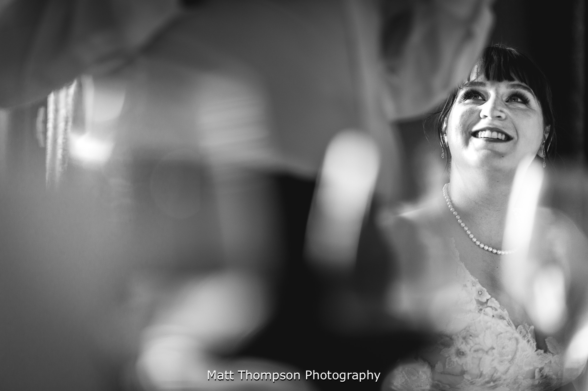 bride listing to grooms speech