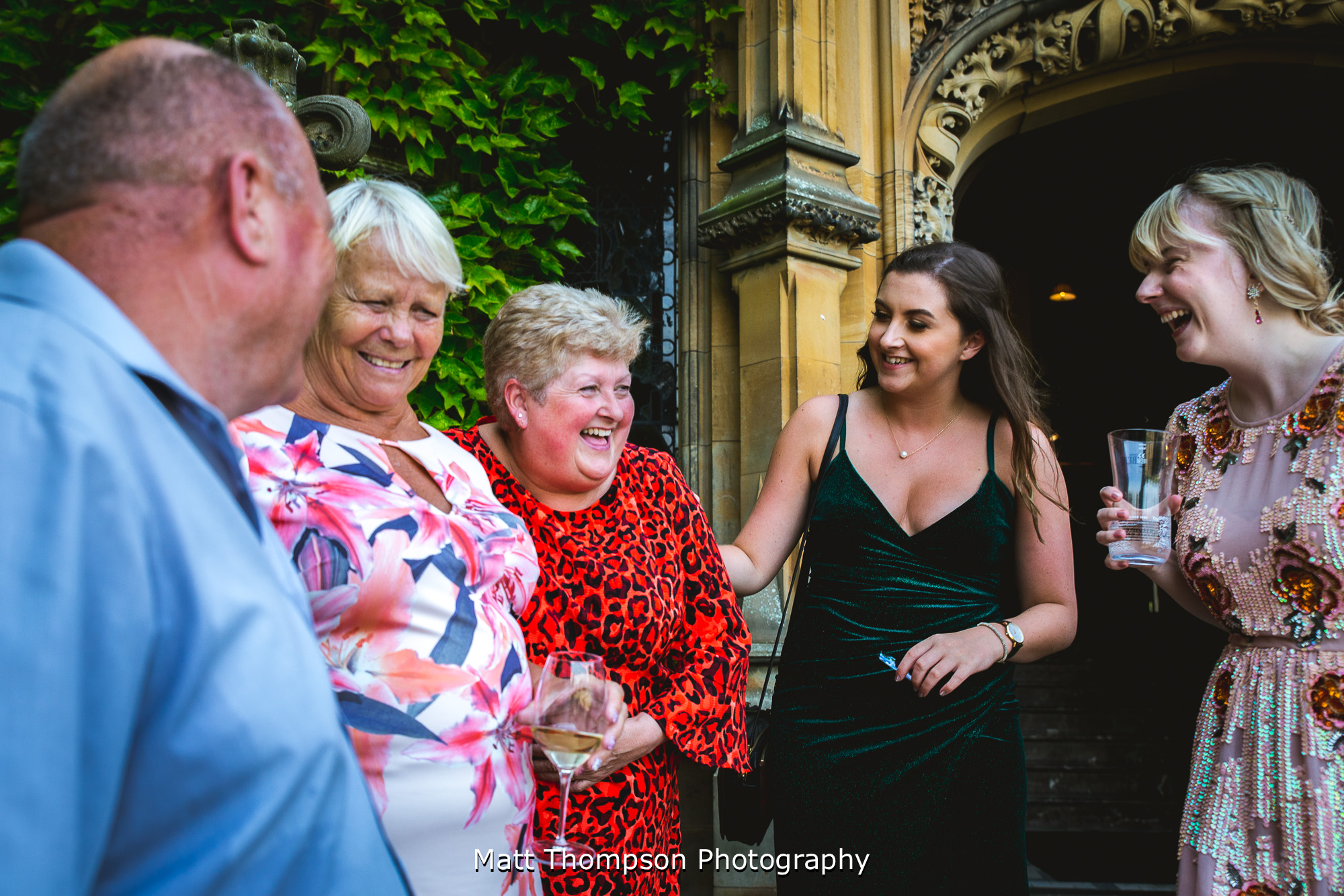 wedding guests laughing