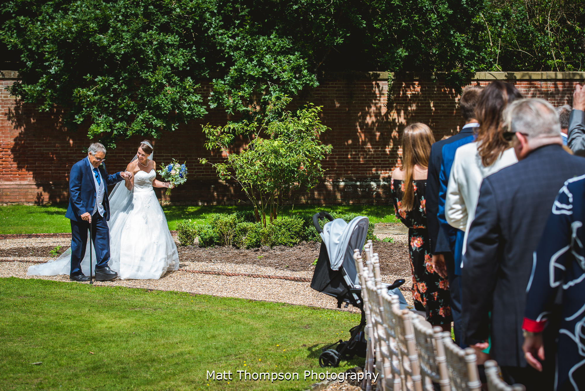 father of the bride walking his daughter