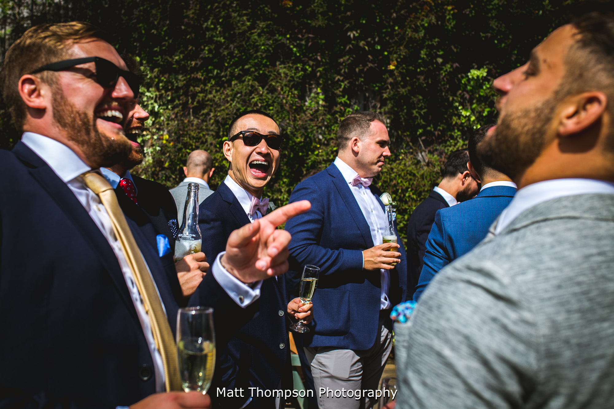 wedding guests laughing