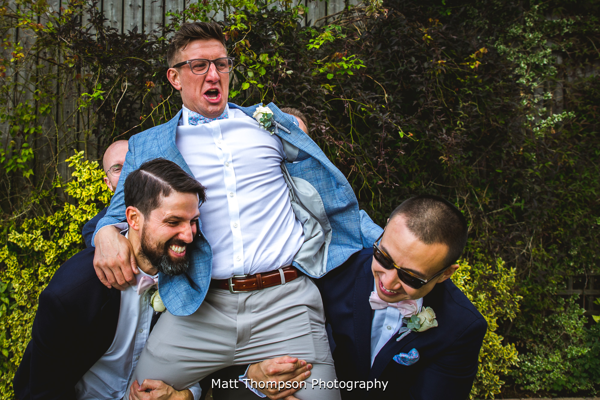 lifting groom up