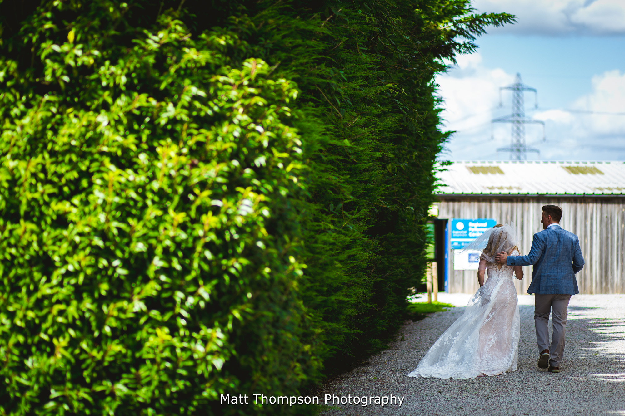 bride and groom sneaking off