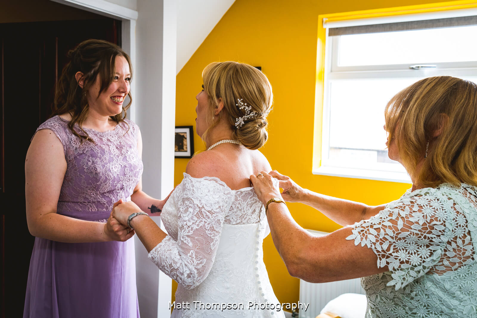 buttoning wedding dress up