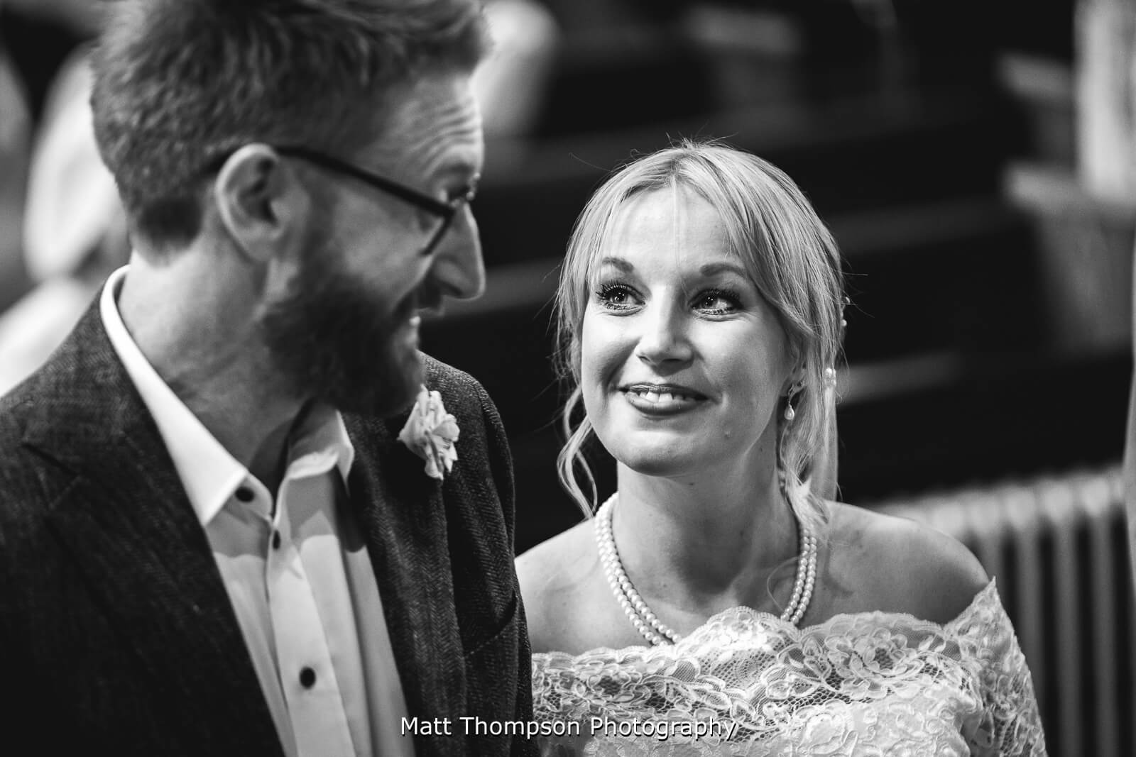 Bride looking at groom
