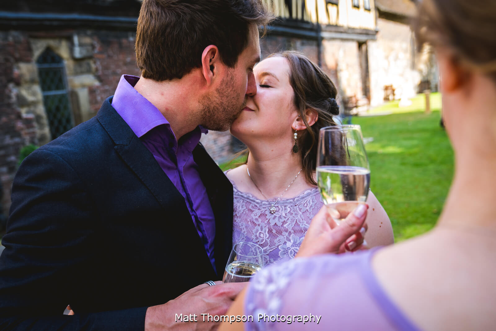 Kissing at a wedding