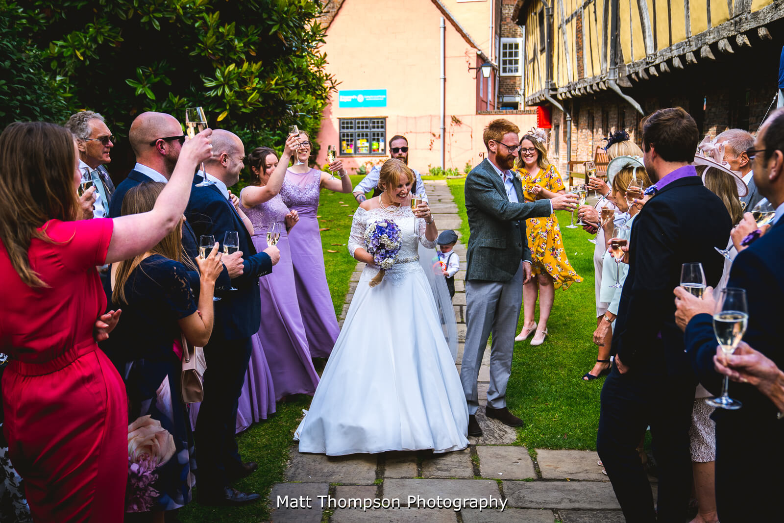 Wedding guests cheering