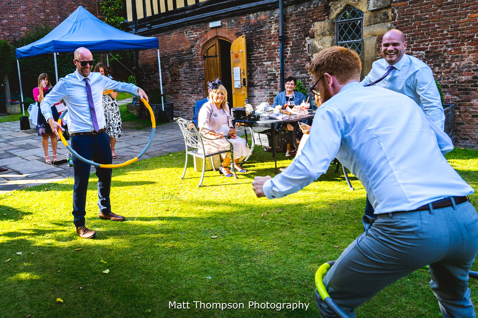 men having fun at wedding
