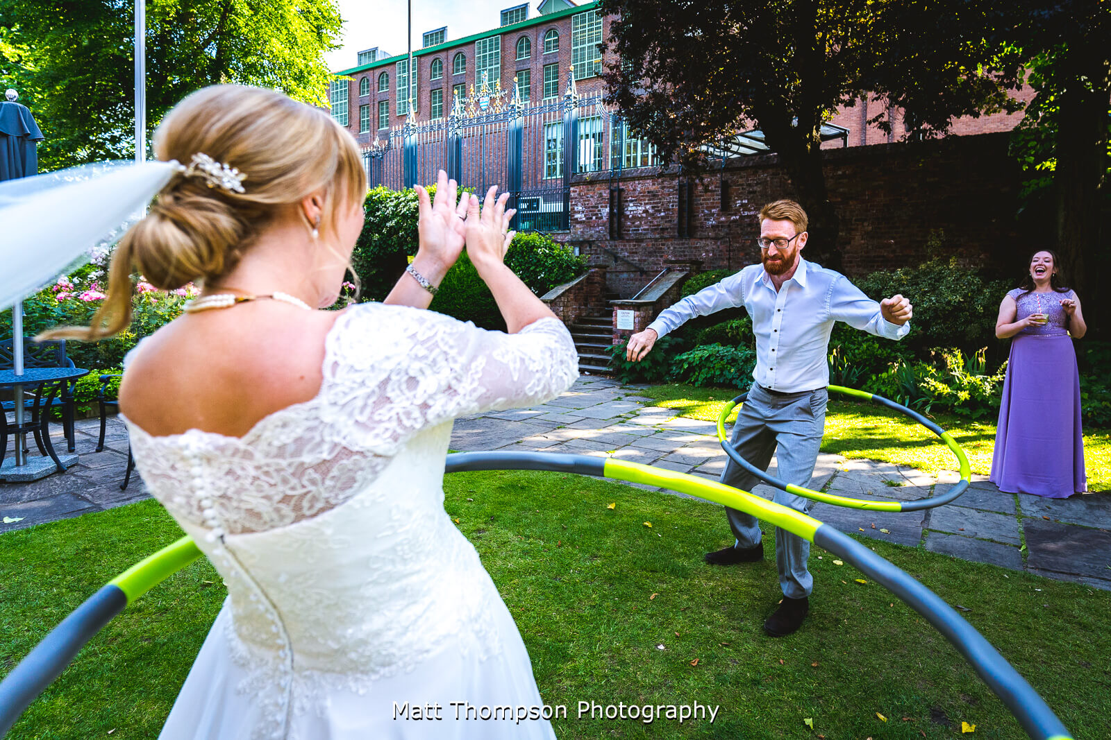 bride and groom hoola hooping