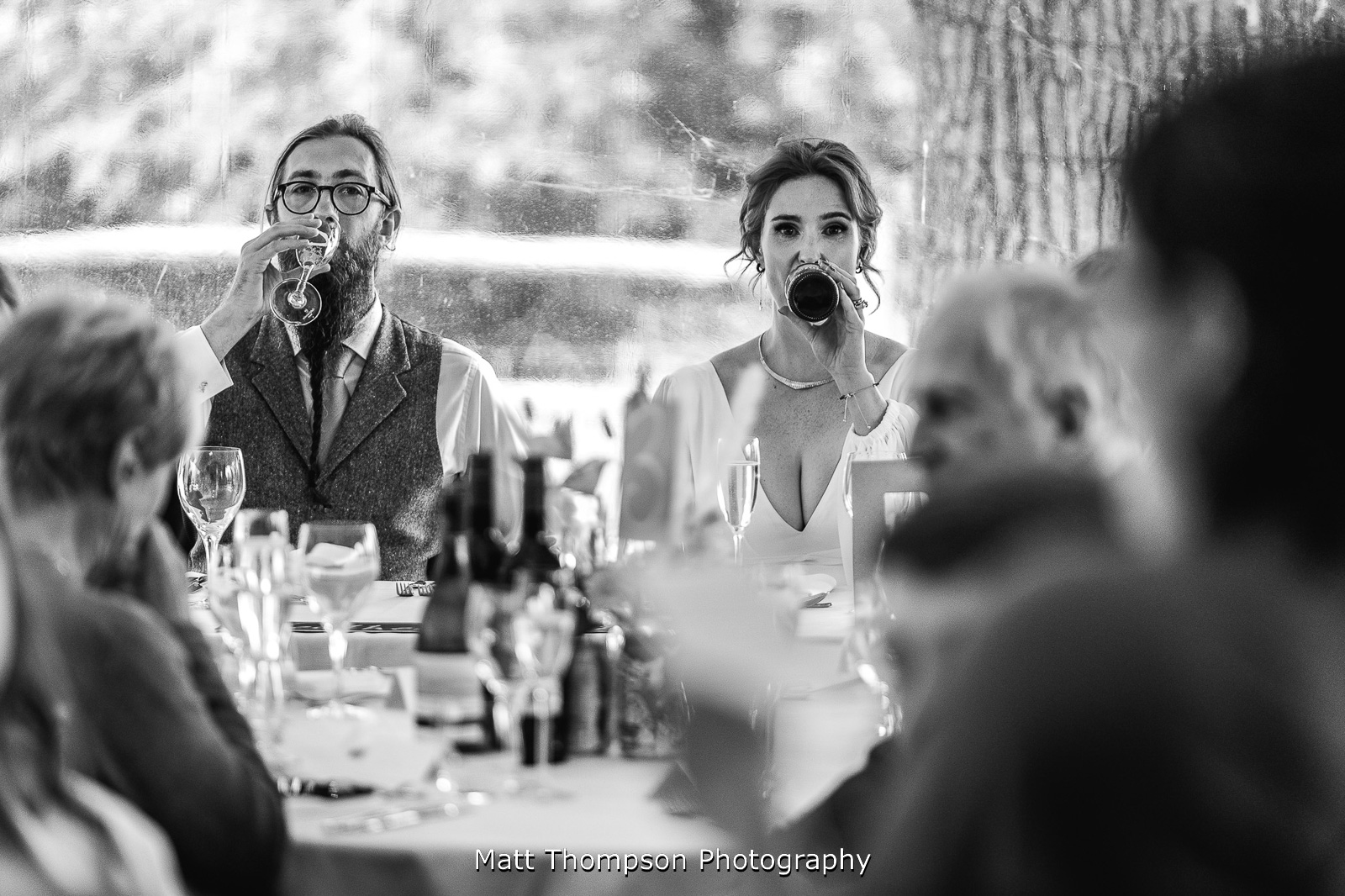 bride and groom drinking